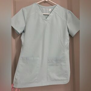 Women’s light blue White Cross scrub top